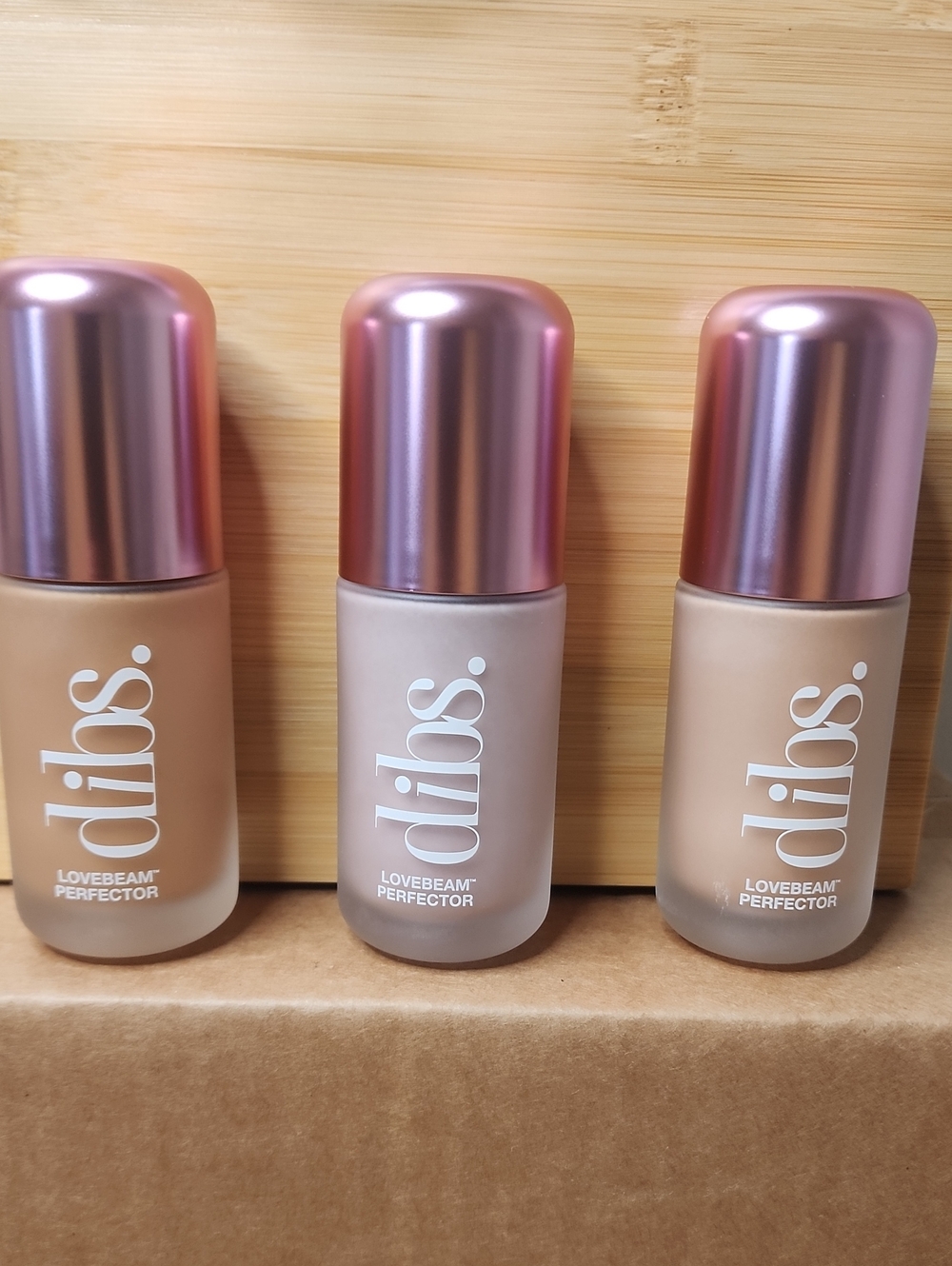 dibs. Lovebeam Perfector Liquid Foundation — Pink Metallic Cap, Multi-Shade